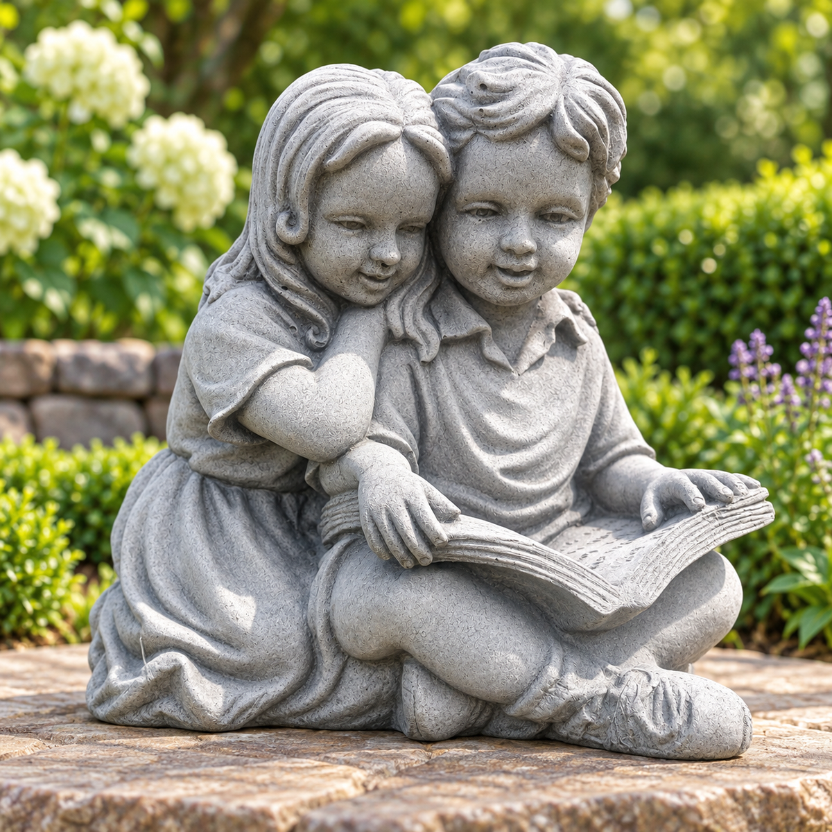 Art Decor Produktbild final 2026-09-24 | G260 | Steinguss-Figur Kinder, mit Buch